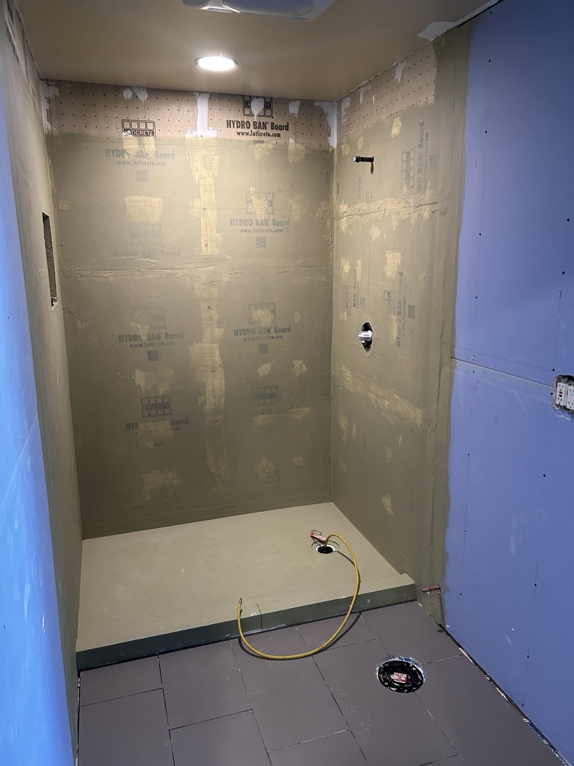 Laticrete Hydro Ban shower boards and shower base installed before tile